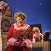 Darren Lawrence (Scrooge) and Claire Storey (Ghost of Christmas Present) in A Christmas Carol