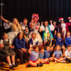The cast with the children of St. Mary’s RC School
