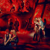 Joelle Moses as Zahara and Glenn Adamson as Strat with the cast of Bat Out Of Hell The Musical