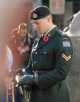 Royal Canadian Legion Corporal paying respects with a moment of silence