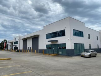 Factory, Warehouse & Industrial commercial property leased at Unit 5/5 Merryvale Road Minto NSW 2566