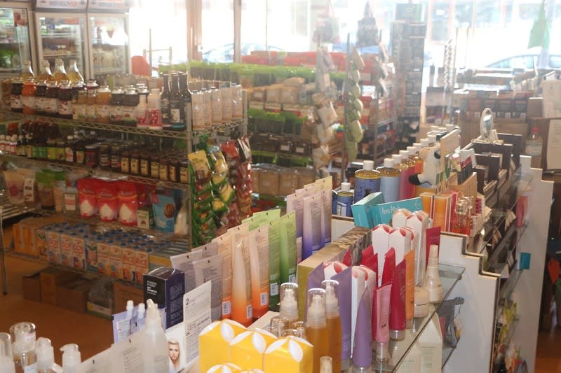 Health Food Store On Busy Main Shopping Strip