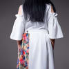 Ruffled white dress with cut-out sleeves and a removable kilt skirt