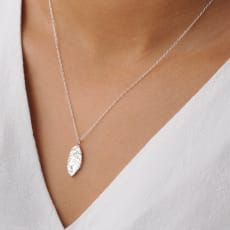 Hopea Silver Leaf Necklace: Each leaf is individually handmade with fine silver and threaded onto a lightweight chain