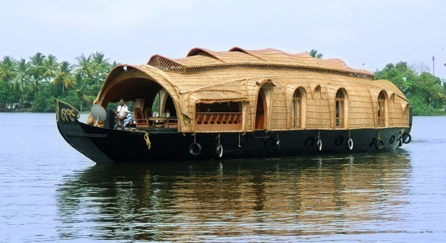 Traditional houseboat on the backwaters of Kerala.