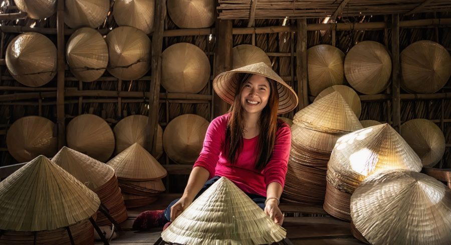 Vietnamese hat-maker in Ho Chi Minh City, Vietnam