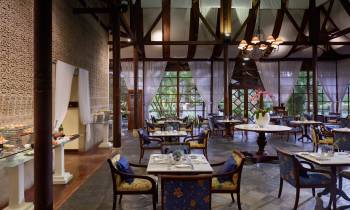 a dining room table in front of a building