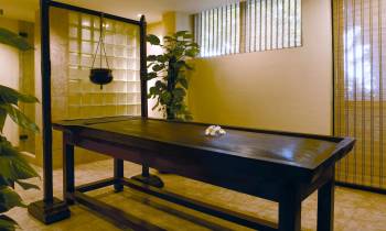 a dining room table in front of a window