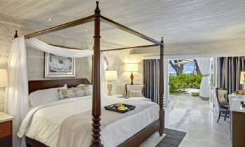 a bedroom with a large bed in a room