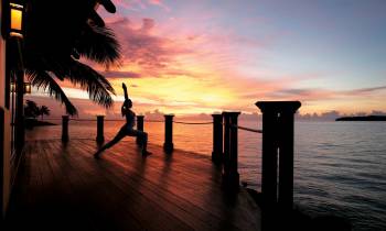 a sunset over a body of water