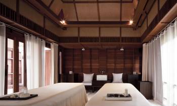 a large white bed in a room