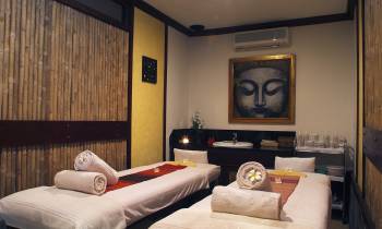 a bedroom with a large bed sitting in a room