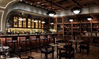 a room filled with furniture and a table in a restaurant