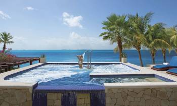 a pool next to a body of water