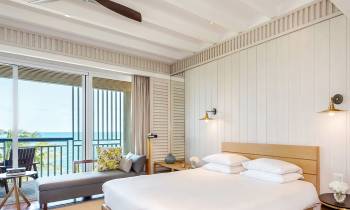 a bedroom with a large window