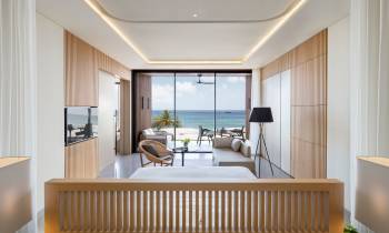 a room filled with furniture and a large window