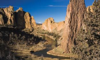 a canyon with Smith Rock State Park in the background