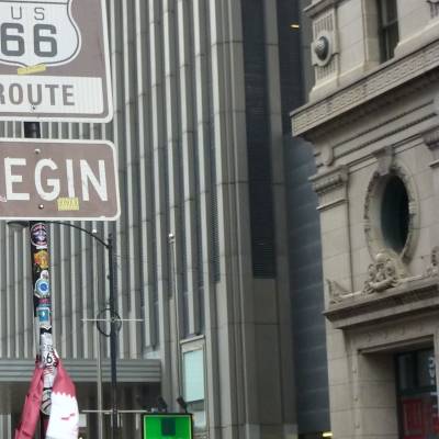 a street sign sitting on the side of a building