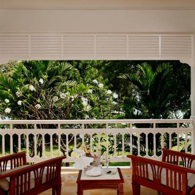 a dining room table in front of a window