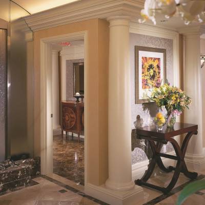 a living room with a large mirror