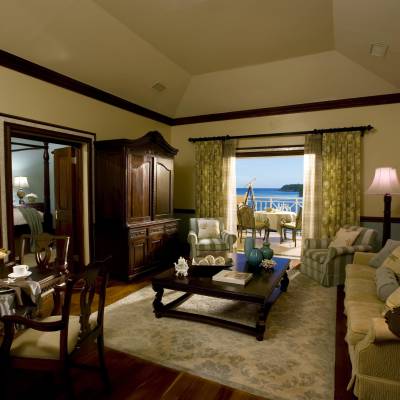 a living room filled with furniture and a large window