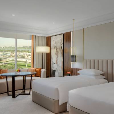 a bedroom with a large bed in a room