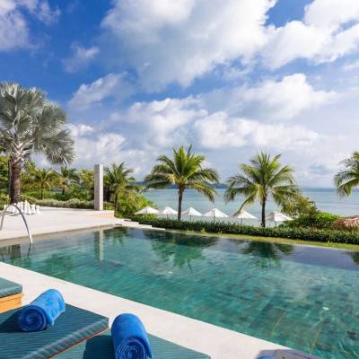 a pool next to a body of water