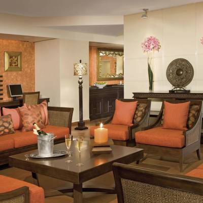 a living room filled with furniture and a fire place