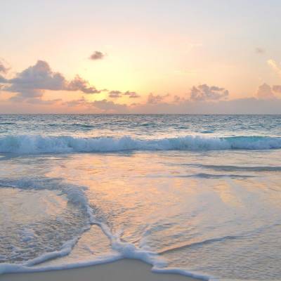 a sunset over a body of water