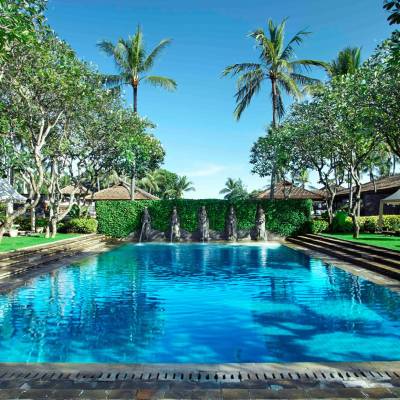 a pool next to a body of water
