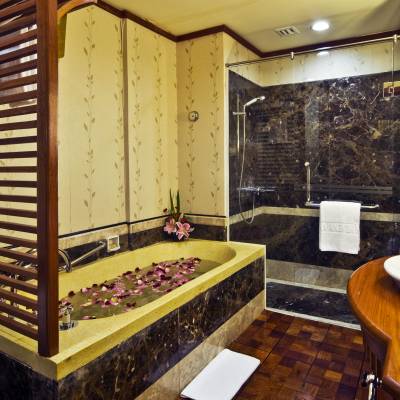 a room with a sink and a mirror