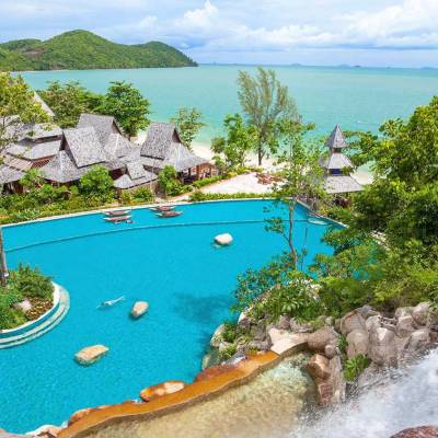 a pool next to a body of water