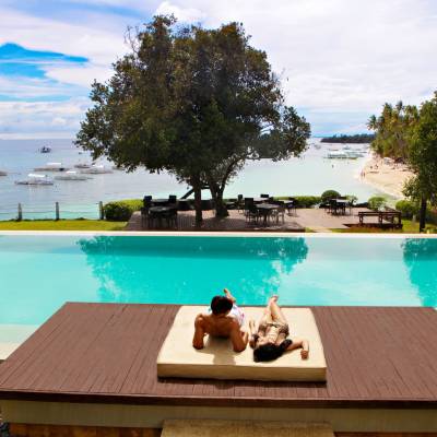 a pool next to a body of water