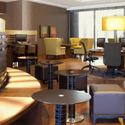an office with a desk and chair in a room