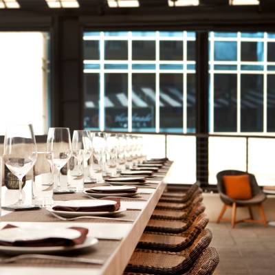 a dining room table in front of a window