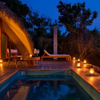 Private pool cabin night view, Chena Huts