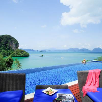 a table topped with a blue umbrella