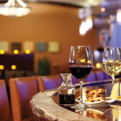 a dining table filled with wine glasses