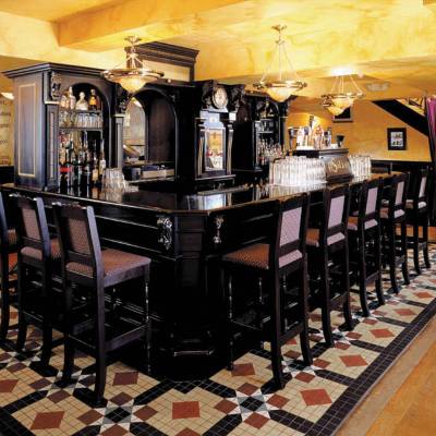 a room filled with furniture and a table in a restaurant