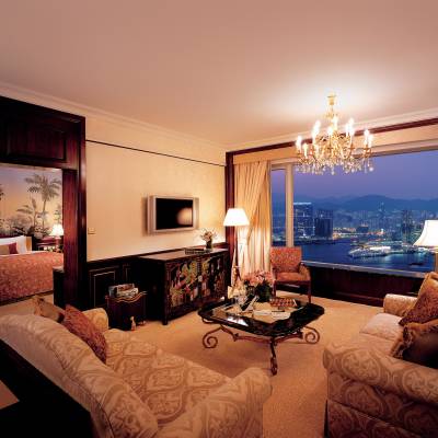 a view of a living room filled with furniture and a fireplace