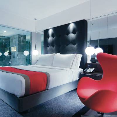 a large red chair in a room