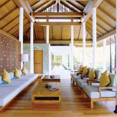 a living room filled with furniture on top of a wooden table