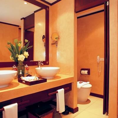 a room with a sink and a mirror