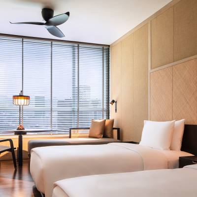 a bedroom with a bed in a hotel room