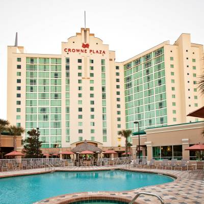 a large building with a pool