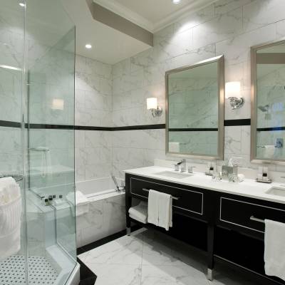 a double sink and large mirror