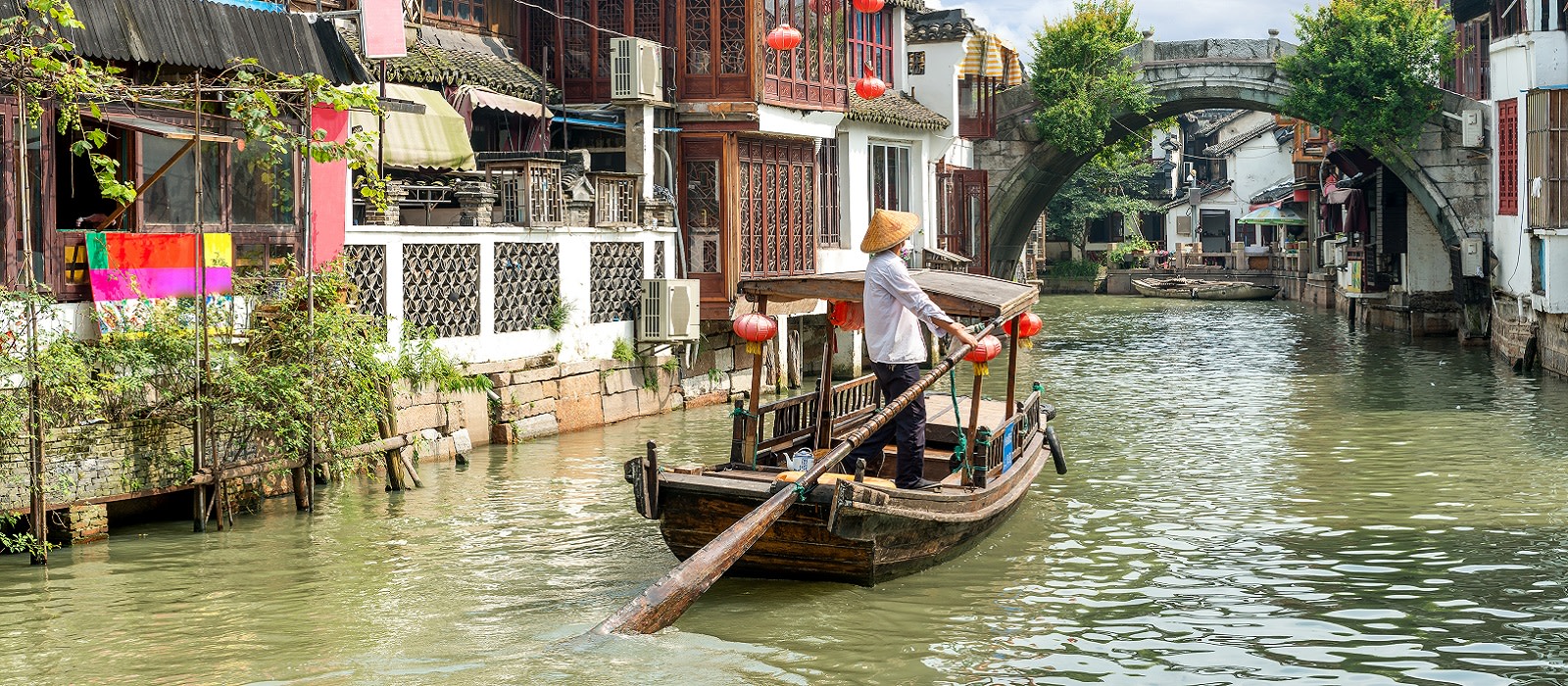 Enchanting Travels China Tours China traditional tourist boats on canals of Shanghai Zhujiajiao Water Town in Shanghai, China Best time to visit China
