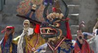 Enchanting Travels Tibet Tours Tibet Buddhist lama ritual mask Cham Dance Tibetan monastery Himalayas