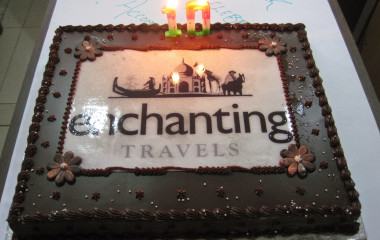 Enchanting Travels Logo Torte