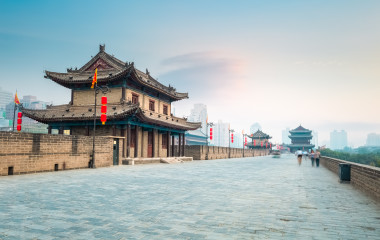 Enchanting Travels China Tours beautiful xian city wall and ancient tower at dusk, China